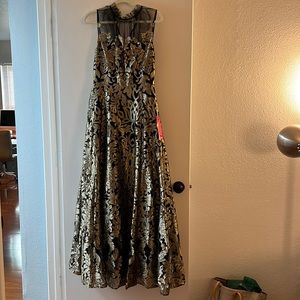 Beautiful Alex Marie Ball Gown. Black and Gold with tulle. Size 6.
